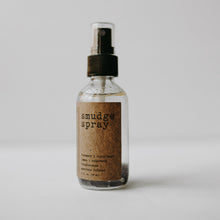Load image into Gallery viewer, Amethyst Infused Essential Oil Smudge Spray. Clear 2 oz bottle with purple amethyst gemstones in it.
