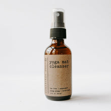 Load image into Gallery viewer, Yoga mat cleanser with rose quartz gemstones in a 2 oz glass amber bottle with a white background.
